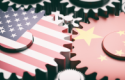 Two gear interlocked with American and Chinese flags