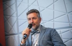 Man speaking into a microphone