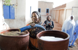 Students in Sudan receive water delivered by tanker by the UN African Union-United Nations Hybrid Operation in Darfur (UNAMID).