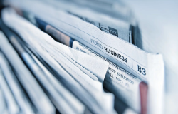 Stack of English Language Newspapers