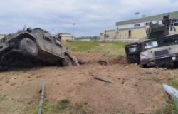 Humvees in ditch
