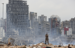 A soldier stands at the devastated site of the explosion in the port of Beirut, Lebanon, 