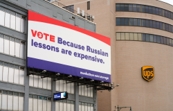 27 SEP 2020- View of a political ad on a billboard saying VOTE because Russian lessons are expensive on a Manhattan Mini Storage building in Manhattan, New York.