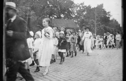 Children of Riga marching to the railway station of Riga