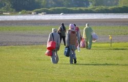 Canadian Sikhs walking in a field