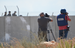 Journalists film the Israeli military during the Friday protests, Bilin, Palestine