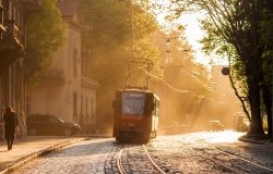 Old orange tram in backlight. Lviv (Lvov), Ukraine