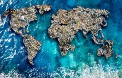 A zoomed out view of earth with continents as garbage