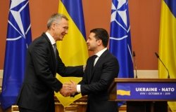 KYIV, UKRAINE- October 31, 2019: NATO Secretary General Jens Stoltenberg speaks to Ukrainian President Volodymyr Zelensky after the Ukraine-NATO Commission meeting