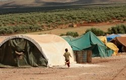 Internally displaced child Syrian refugees in the Atmeh refugee camp, Idlib, Syria.