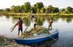 Tis Issat, Ethiopia - Feb 05, 2020: People living near the Blue Nile falls, Tis-Isat Falls, meaning great smoke in Amharic in Amara region of Ethiopia, Eastern Africa