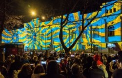 Blue and Yellow projection on a building 