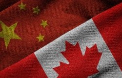 3D rendering of the flags of China and Canada on woven fabric texture. Concept of political, economic; or cultural cooperation between the two nations. Detailed textile pattern and grunge theme.