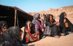 Group of Afghan women sitting. 