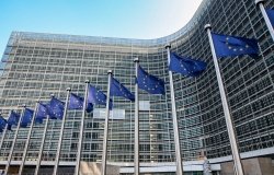 European flags on background of EU Parliament