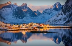 Colorful winter sunrise in the fishing village of Reine, Lofoten archipelago, Norway, above the arctic circle