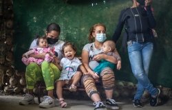 Masked Refugee Women