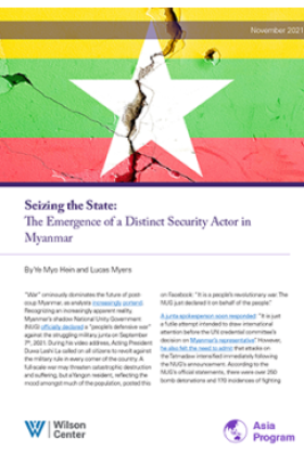 The cover of the report Seizing the State, which shows the flag of Myanmar.