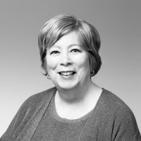 A black and white photo of Carolyn Bartholomew